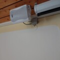 View of a mounted loudspeaker next to the screen.